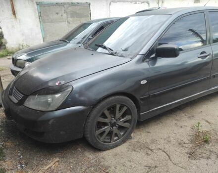 Сірий Міцубісі Lancer, об'ємом двигуна 2 л та пробігом 230 тис. км за 1800 $, фото 1 на Automoto.ua