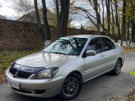 Мицубиси Лансер 2006 в Погребище на Automoto.ua Серый Мицубиси Лансер, объемом двигателя 2 л и пробегом 320 тыс. км за 3300 $, фото 1 на Automoto.ua