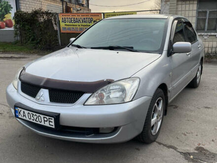Мицубиси Лансер 2006 в Мироновке на Automoto.ua Серый Мицубиси Лансер, объемом двигателя 1.58 л и пробегом 430 тыс. км за 2850 $, фото 1 на Automoto.ua