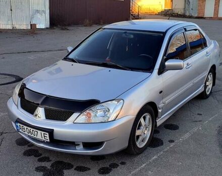 Сірий Міцубісі Lancer, об'ємом двигуна 1.58 л та пробігом 207 тис. км за 4300 $, фото 1 на Automoto.ua