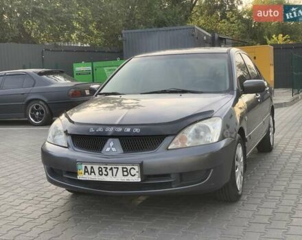 Сірий Міцубісі Lancer, об'ємом двигуна 1.58 л та пробігом 276 тис. км за 3800 $, фото 1 на Automoto.ua