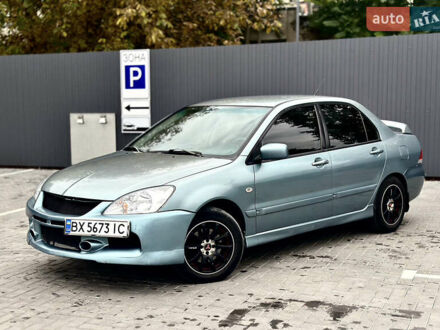 Міцубісі Lancer 2006 у Хмельницькому на Automoto.ua Сірий Міцубісі Lancer, об'ємом двигуна 1.58 л та пробігом 354 тис. км за 2999 $, фото 1 на Automoto.ua