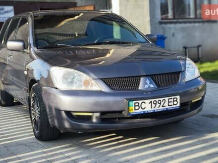 Мицубиси Лансер 2006 в Львове на Automoto.ua Серый Мицубиси Лансер, объемом двигателя 1.58 л и пробегом 320 тыс. км за 3900 $, фото 1 на Automoto.ua