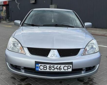 Серый Мицубиси Лансер, объемом двигателя 1.6 л и пробегом 265 тыс. км за 3750 $, фото 1 на Automoto.ua