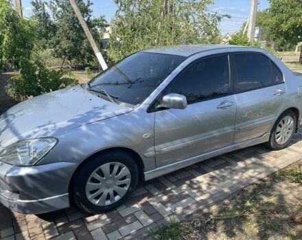 Сірий Міцубісі Lancer, об'ємом двигуна 0 л та пробігом 200 тис. км за 4498 $, фото 1 на Automoto.ua