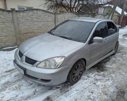 Сірий Міцубісі Lancer, об'ємом двигуна 1.6 л та пробігом 290 тис. км за 1500 $, фото 1 на Automoto.ua