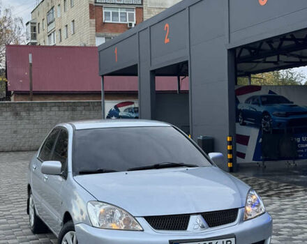Сірий Міцубісі Lancer, об'ємом двигуна 1.6 л та пробігом 269 тис. км за 4000 $, фото 1 на Automoto.ua
