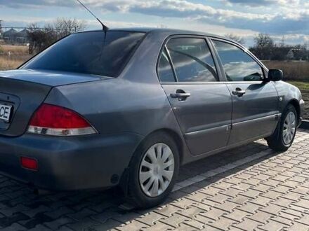 Мицубиси Лансер 2006 в Полтаве на Automoto.ua Серый Мицубиси Лансер, объемом двигателя 1.6 л и пробегом 255 тыс. км за 4500 $, фото 1 на Automoto.ua