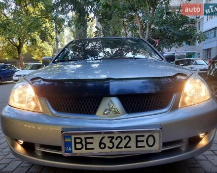 Сірий Міцубісі Lancer, об'ємом двигуна 1.58 л та пробігом 235 тис. км за 5000 $, фото 1 на Automoto.ua