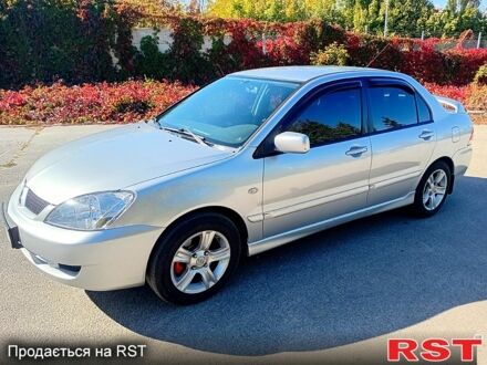 Сірий Міцубісі Lancer, об'ємом двигуна 1.6 л та пробігом 226 тис. км за 4000 $, фото 1 на Automoto.ua