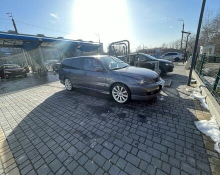Серый Мицубиси Лансер, объемом двигателя 2 л и пробегом 3 тыс. км за 3000 $, фото 1 на Automoto.ua