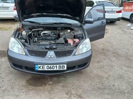 Серый Мицубиси Лансер, объемом двигателя 1.58 л и пробегом 271 тыс. км за 4600 $, фото 1 на Automoto.ua
