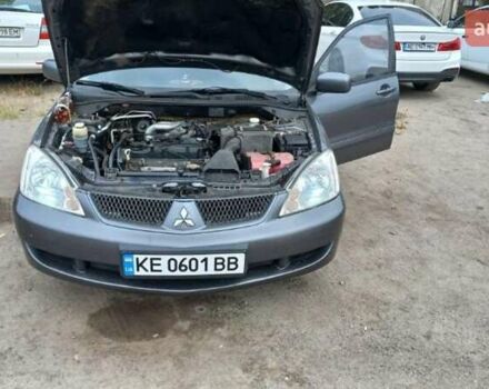 Серый Мицубиси Лансер, объемом двигателя 1.58 л и пробегом 271 тыс. км за 4600 $, фото 1 на Automoto.ua