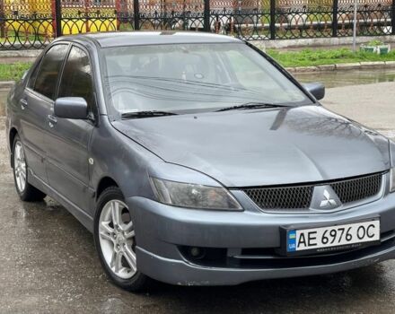 Серый Мицубиси Лансер, объемом двигателя 0 л и пробегом 245 тыс. км за 3500 $, фото 1 на Automoto.ua