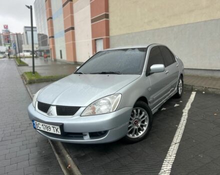 Сірий Міцубісі Lancer, об'ємом двигуна 1.6 л та пробігом 186 тис. км за 4699 $, фото 1 на Automoto.ua