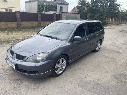 Сірий Міцубісі Lancer, об'ємом двигуна 2 л та пробігом 257 тис. км за 5000 $, фото 1 на Automoto.ua