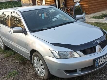 Сірий Міцубісі Lancer, об'ємом двигуна 1.6 л та пробігом 185 тис. км за 3699 $, фото 1 на Automoto.ua