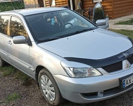 Сірий Міцубісі Lancer, об'ємом двигуна 1.6 л та пробігом 185 тис. км за 3699 $, фото 1 на Automoto.ua