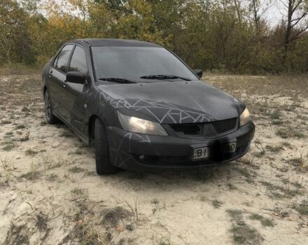 Мицубиси Лансер 2006 в Синельниковом на Automoto.ua Серый Мицубиси Лансер, объемом двигателя 2 л и пробегом 200 тыс. км за 3000 $, фото 1 на Automoto.ua