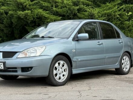 Мицубиси Лансер 2006 в Запорожье на Automoto.ua Серый Мицубиси Лансер, объемом двигателя 1.6 л и пробегом 220 тыс. км за 4599 $, фото 1 на Automoto.ua