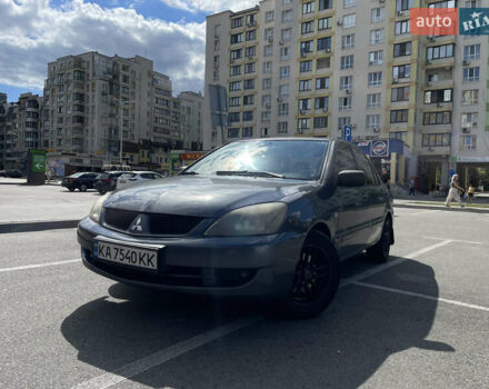 Сірий Міцубісі Lancer, об'ємом двигуна 1.6 л та пробігом 316 тис. км за 3800 $, фото 1 на Automoto.ua