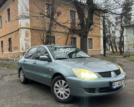 Сірий Міцубісі Lancer, об'ємом двигуна 1.6 л та пробігом 240 тис. км за 3000 $, фото 1 на Automoto.ua
