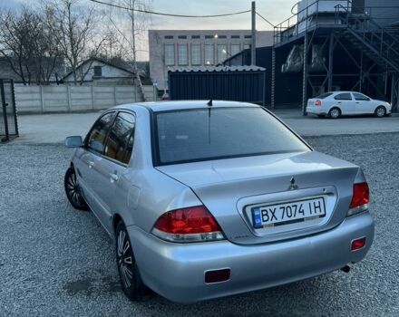 Серый Мицубиси Лансер, объемом двигателя 1.6 л и пробегом 193 тыс. км за 3350 $, фото 1 на Automoto.ua