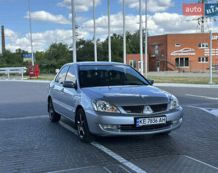 Сірий Міцубісі Lancer, об'ємом двигуна 1.58 л та пробігом 294 тис. км за 4700 $, фото 1 на Automoto.ua