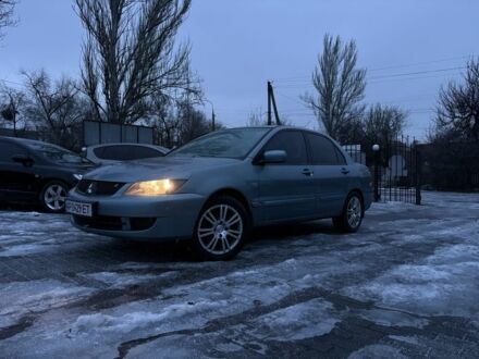 Сірий Міцубісі Lancer, об'ємом двигуна 1.6 л та пробігом 220 тис. км за 3999 $, фото 1 на Automoto.ua