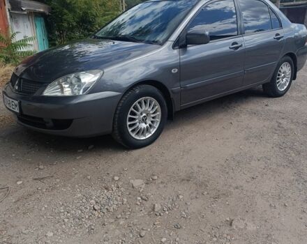 Сірий Міцубісі Lancer, об'ємом двигуна 1.6 л та пробігом 191 тис. км за 4900 $, фото 1 на Automoto.ua