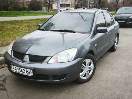 Сірий Міцубісі Lancer, об'ємом двигуна 1.6 л та пробігом 263 тис. км за 3650 $, фото 1 на Automoto.ua
