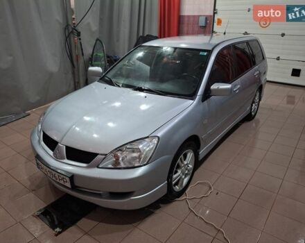 Серый Мицубиси Лансер, объемом двигателя 1.58 л и пробегом 272 тыс. км за 2800 $, фото 1 на Automoto.ua