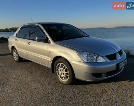 Сірий Міцубісі Lancer, об'ємом двигуна 1.58 л та пробігом 190 тис. км за 4600 $, фото 1 на Automoto.ua