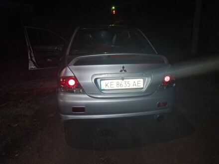 Сірий Міцубісі Lancer, об'ємом двигуна 2 л та пробігом 1000 тис. км за 3600 $, фото 1 на Automoto.ua