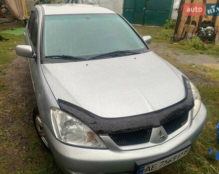 Сірий Міцубісі Lancer, об'ємом двигуна 1.58 л та пробігом 238 тис. км за 5000 $, фото 1 на Automoto.ua