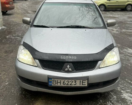 Серый Мицубиси Лансер, объемом двигателя 2 л и пробегом 226 тыс. км за 4900 $, фото 1 на Automoto.ua