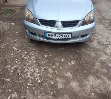 Серый Мицубиси Лансер, объемом двигателя 1.58 л и пробегом 223 тыс. км за 3200 $, фото 1 на Automoto.ua