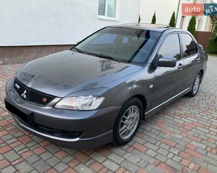 Сірий Міцубісі Lancer, об'ємом двигуна 2 л та пробігом 240 тис. км за 3700 $, фото 1 на Automoto.ua