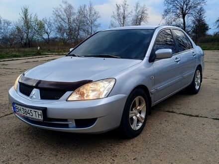 Мицубиси Лансер 2006 в Подольск (Котовск) на Automoto.ua Серый Мицубиси Лансер, объемом двигателя 1.6 л и пробегом 220 тыс. км за 5300 $, фото 1 на Automoto.ua