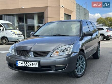 Сірий Міцубісі Lancer, об'ємом двигуна 1.59 л та пробігом 279 тис. км за 4999 $, фото 1 на Automoto.ua