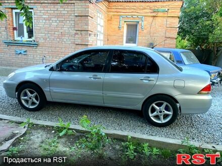 Мицубиси Лансер 2006 в Кропивницком (Кировограде) на Automoto.ua Серый Мицубиси Лансер, объемом двигателя 1.6 л и пробегом 0 тыс. км за 3999 $, фото 1 на Automoto.ua