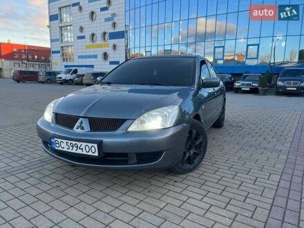 Серый Мицубиси Лансер, объемом двигателя 1.6 л и пробегом 279 тыс. км за 3990 $, фото 1 на Automoto.ua
