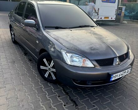 Серый Мицубиси Лансер, объемом двигателя 1.6 л и пробегом 0 тыс. км за 4000 $, фото 1 на Automoto.ua