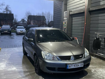 Серый Мицубиси Лансер, объемом двигателя 1.6 л и пробегом 213 тыс. км за 4500 $, фото 1 на Automoto.ua