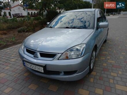 Сірий Міцубісі Lancer, об'ємом двигуна 1.59 л та пробігом 151 тис. км за 4900 $, фото 1 на Automoto.ua