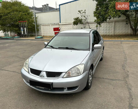 Серый Мицубиси Лансер, объемом двигателя 1.58 л и пробегом 183 тыс. км за 4800 $, фото 1 на Automoto.ua