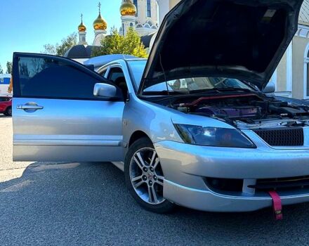 Серый Мицубиси Лансер, объемом двигателя 2 л и пробегом 0 тыс. км за 5500 $, фото 1 на Automoto.ua