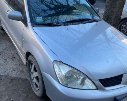 Серый Мицубиси Лансер, объемом двигателя 1.6 л и пробегом 350 тыс. км за 2200 $, фото 1 на Automoto.ua