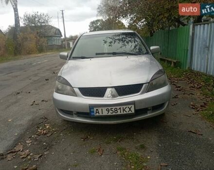 Сірий Міцубісі Lancer, об'ємом двигуна 1.6 л та пробігом 350 тис. км за 4000 $, фото 1 на Automoto.ua