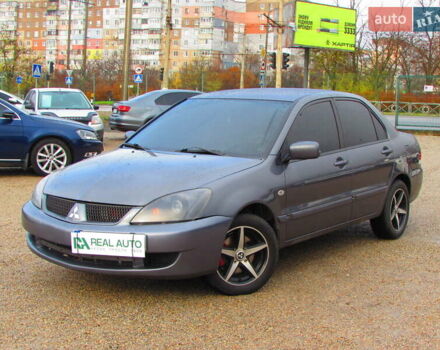 Сірий Міцубісі Lancer, об'ємом двигуна 1.58 л та пробігом 300 тис. км за 3600 $, фото 1 на Automoto.ua